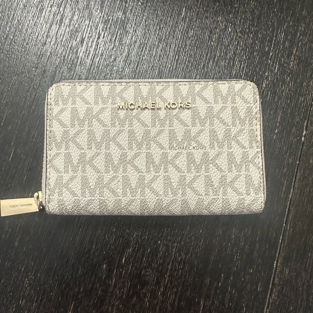 Woman’s MK wallet